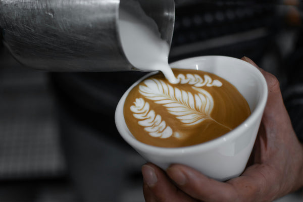 A cup of cappuccino with latte art