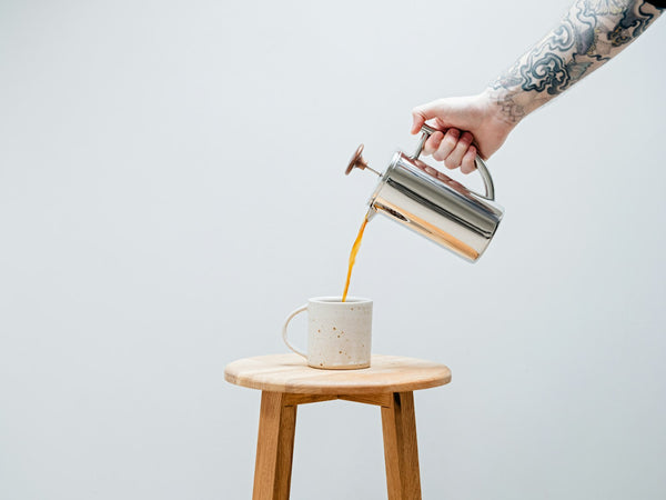 Pouring coffee from a French press